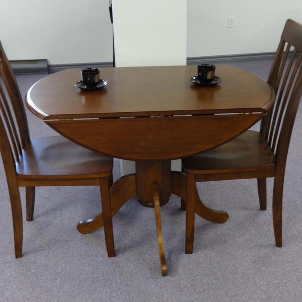 C.A. Munro Limited Round Dining Table with Pedestal Base HM4242-PE-30OAK-T/B IMAGE 1